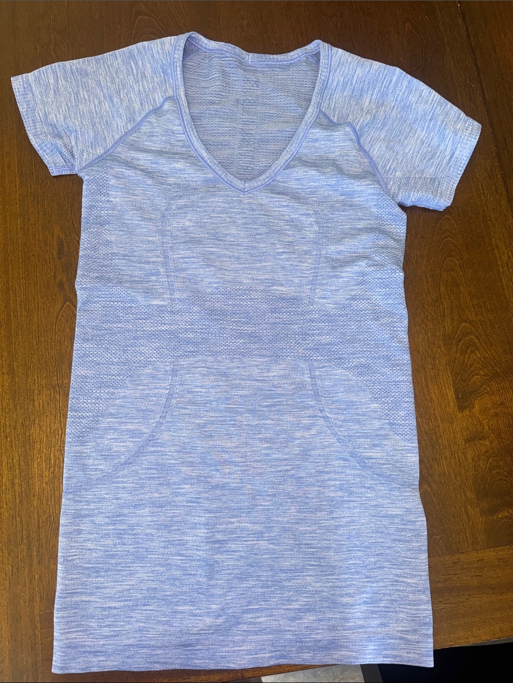 Light blue women’s size 4 Lululemon short sleeve shirt!